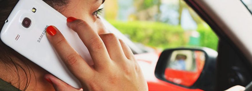 Managing phone use while driving: will switching to silent mode suffice?