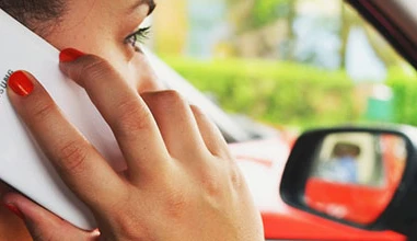 Managing phone use while driving: will switching to silent mode suffice?