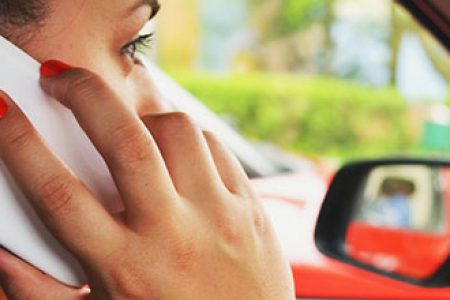 Managing phone use while driving: will switching to silent mode suffice?